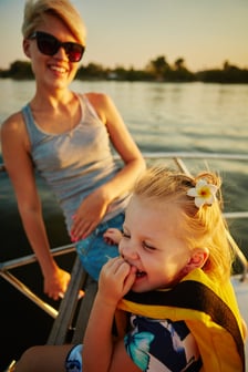 Mother and Child on a Boat Financed by Azura