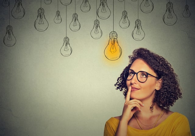 Woman deciding between a bank or credit union